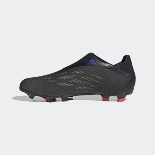ADIDAS Unisex X Speedflow .3 Laceless FG Soccer Shoe - Black/Sonic Ink/Solar Yellow - Image 4